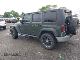 2007 Jeep Wrangler Unlimited X with VIN 1J4GA39127L231378, listed as a IAAI auction lot 42252475 with 152,568 mi miles and . Bid and sale history available at DreamBid. Image 3.