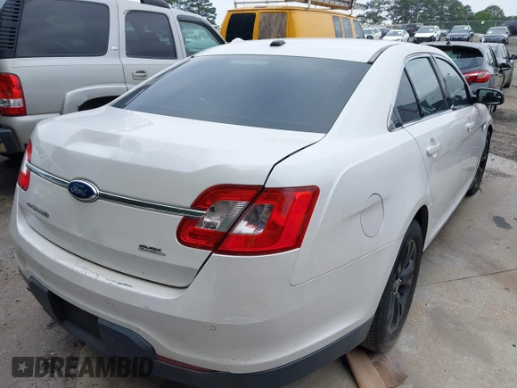 2012 Ford Taurus SEL with VIN 1FAHP2EW4CG130131, listed as a IAAI auction lot 42079457 with 162,101 mi miles and . Bid and sale history available at DreamBid. Image 4.