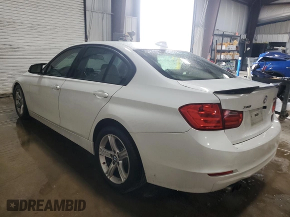 2013 BMW 3 Series 328i xDrive with VIN WBA3B3C52DF530860, listed as a Copart auction lot 53248425 with 154,254 mi miles and Salvage Title. Bid and sale history available at carsss.com. Image 2.