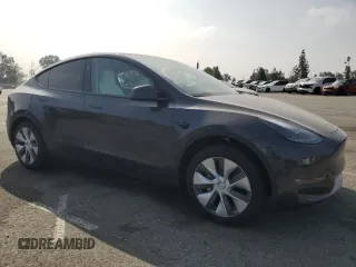 2024 Tesla Model Y Long Range with VIN 7SAYGDEE1RA266653, listed as a Copart auction lot 62277865 with 8,189 mi miles and Salvage title. Bid and sale history available at DreamBid. Image 4.