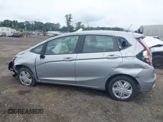 2019 Honda Fit LX z VIN 3HGGK5H45KM725916, wystawiony jako IAAI lot #42654907 z przebiegiem 92 580 mil mil oraz . Historia ofert i sprzedaży dostępna na DreamBid. Obrazek 14.