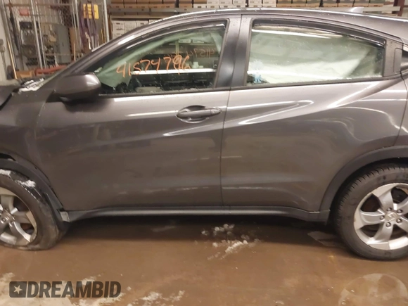 2018 Honda HR-V LX with VIN 3CZRU6H35JM704037, listed as a IAAI auction lot 41574796 with 140,671 mi miles. Bid and sale history available at carsss.com. Image 15.