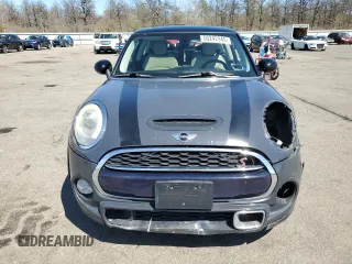 2014 MINI Hardtop S with VIN WMWXM7C54ET985344, listed as a Copart auction lot 55242945 with 87,017 mi miles and Salvage Title. Bid and sale history available at DreamBid. Image 5.