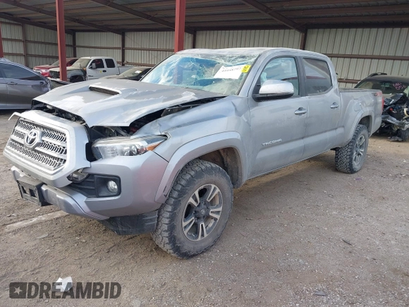2017 Toyota Tacoma SR5 with VIN 3TMDZ5BN3HM025433, listed as a IAAI auction lot 41058797 with 68,355 mi miles and . Bid and sale history available at DreamBid. Image 18.