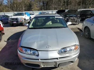 2001 Oldsmobile Aurora z VIN 1G3GS64C614157056, wystawiony jako Copart lot #88938065 z przebiegiem 121 688 mil mil oraz Szkody całkowita. Historia ofert i sprzedaży dostępna na DreamBid. Obrazek 5.