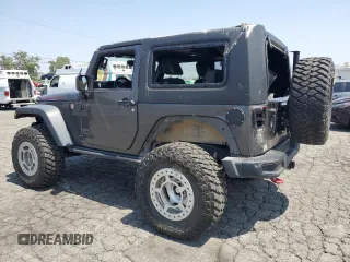 2016 Jeep Wrangler Rubicon z VIN 1C4BJWCG3GL275971, wystawiony jako Copart lot #60329125 z przebiegiem 25 956 mil mil oraz Szkoda całkowita • Salvage title. Historia ofert i sprzedaży dostępna na DreamBid. Obrazek 2.