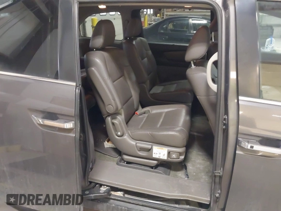 2015 Honda Odyssey EX-L with VIN 5FNRL5H64FB055890, listed as a IAAI auction lot 41706141 with 155,167 mi miles and . Bid and sale history available at carsss.com. Image 8.
