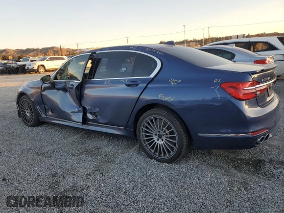 2017 BMW 7 Series with VIN WBA7F2C35HG855999, listed as a Copart auction lot 38122564 with 85,926 mi miles and . Bid and sale history available at DreamBid. Image 2.