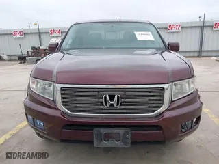 2014 Honda Ridgeline RTL with VIN 5FPYK1F52EB010700, listed as a IAAI auction lot 41490401 with 180,947 mi miles. Bid and sale history available at carsss.com. Image 12.