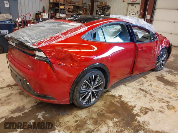 2024 Toyota Prius LE with VIN JTDADABU8R3013976, listed as a IAAI auction lot 41621800 with 7,475 mi miles and . Bid and sale history available at DreamBid. Image 4.
