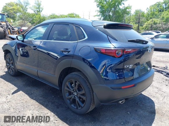2024 Mazda CX-30 S Select Sport with VIN 3MVDMBBM2RM657781, listed as a IAAI auction lot 42297311 with 13,677 mi miles and . Bid and sale history available at DreamBid. Image 3.