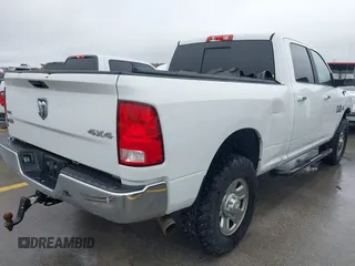 2017 Ram 2500 SLT with VIN 3C6UR5DL3HG673971, listed as a IAAI auction lot 41564109 with 159,214 mi miles and . Bid and sale history available at DreamBid. Image 4.