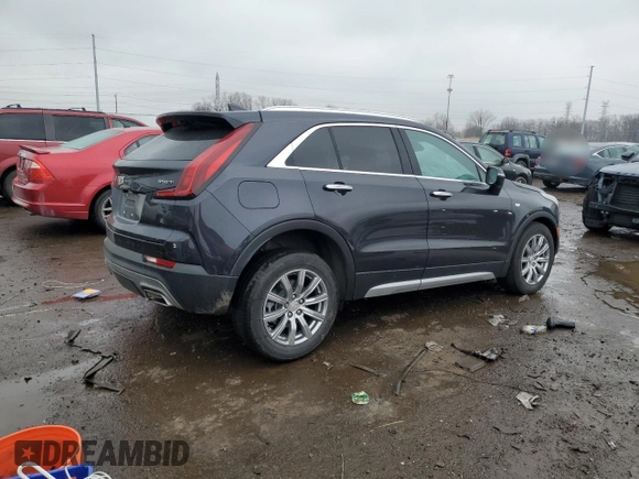 2023 Cadillac XT4 AWD Premium Luxury with VIN 1GYFZDR40PF101649, listed as a Copart auction lot 52585345 with Not provided miles and Clean title. Bid and sale history available at DreamBid. Image 3.