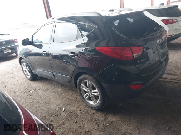 2010 Hyundai Tucson GLS with VIN KM8JU3AC0AU070395, listed as a IAAI auction lot 41933773 with 18,097 mi miles and . Bid and sale history available at DreamBid. Image 3.