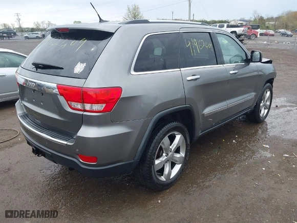 2012 Jeep Grand Cherokee Limited with VIN 1C4RJFBG0CC254425, listed as a IAAI auction lot 41962409 with 256,894 mi miles. Bid and sale history available at carsss.com. Image 4.