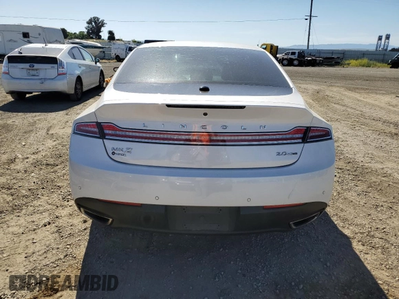 2016 Lincoln MKZ z VIN 3LN6L2G90GR600752, wystawiony jako Copart lot #56599625 z przebiegiem 73 275 mil mil oraz Szkoda całkowita • Salvage title. Historia ofert i sprzedaży dostępna na DreamBid. Obrazek 6.