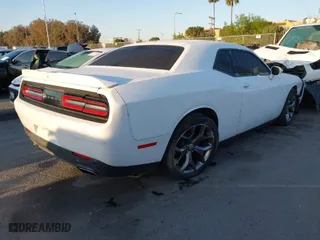2016 Dodge Challenger SXT with VIN 2C3CDZAG6GH345819, listed as a IAAI auction lot 41805707 with 84,845 mi miles. Bid and sale history available at carsss.com. Image 4.