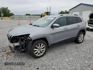 2014 Jeep Cherokee Limited with VIN 1C4PJMDS2EW265263, listed as a Copart auction lot 60855415 with 126,742 mi miles and Salvage title. Bid and sale history available at DreamBid. Image 1.