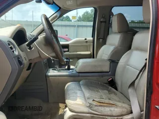 2004 Ford F-150 XLT with VIN 1FTPW14504KD65703, listed as a Copart auction lot 58792215 with 303,083 mi miles and Salvage title. Bid and sale history available at DreamBid. Image 7.