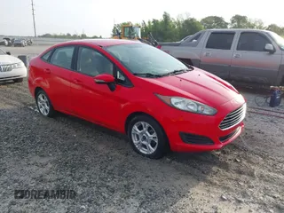 2015 Ford Fiesta SE with VIN 3FADP4BJ6FM132489, listed as a IAAI auction lot 41975658 with 115,653 mi miles. Bid and sale history available at carsss.com. Image 1.