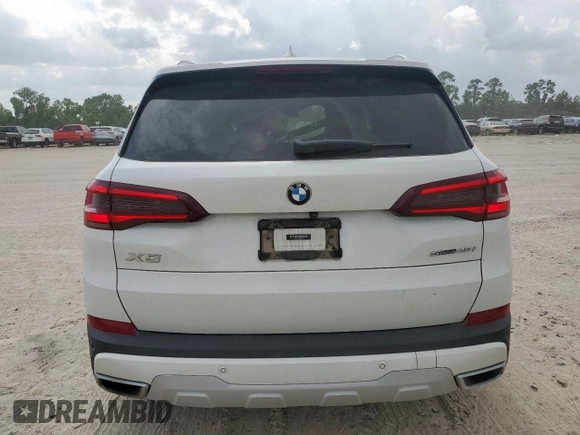2021 BMW X5 sDrive40i with VIN 5UXCR4C06M9F56578, listed as a Copart auction lot 58218315 with 69,927 mi miles and Salvage title. Bid and sale history available at DreamBid. Image 6.