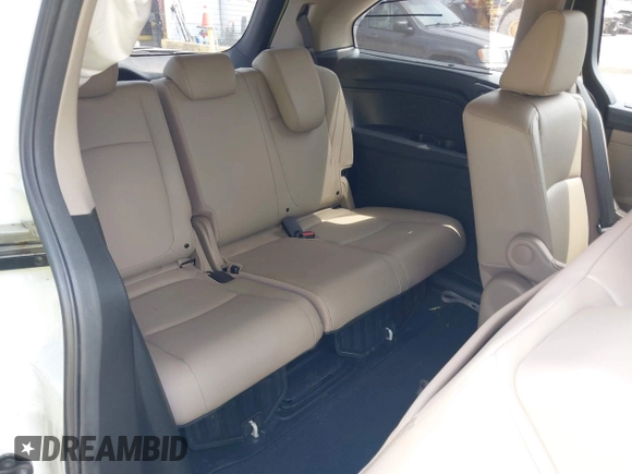 2021 Honda Odyssey Touring with VIN 5FNRL6H80MB010952, listed as a IAAI auction lot 42080412 with 90,594 mi miles and . Bid and sale history available at DreamBid. Image 8.