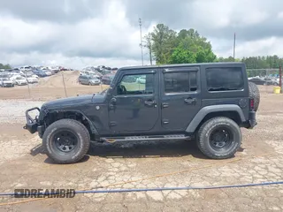 2018 Jeep Wrangler Unlimited Sport S with VIN 1C4BJWDG1JL849635, listed as a IAAI auction lot 42060964 with 60,405 mi miles and . Bid and sale history available at DreamBid. Image 14.
