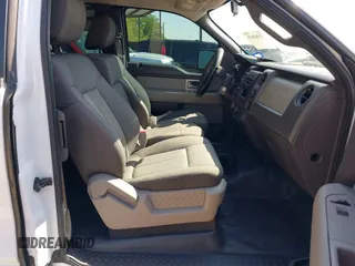 2009 Ford F-150 STX with VIN 1FTRX12W89KC52056, listed as a IAAI auction lot 41982659 with 318,539 mi miles. Bid and sale history available at carsss.com. Image 5.