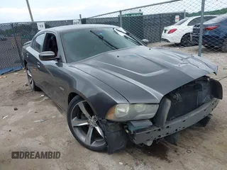 2014 Dodge Charger SXT z VIN 2C3CDXHG9EH330142, wystawiony jako IAAI lot #42123989 z przebiegiem 121 859 mil mil oraz . Historia ofert i sprzedaży dostępna na DreamBid. Obrazek 1.