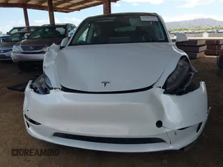 2021 Tesla Model Y Long Range with VIN 5YJYGAEE9MF254113, listed as a IAAI auction lot 42045256 with Not Provided miles. Bid and sale history available at carsss.com. Image 11.
