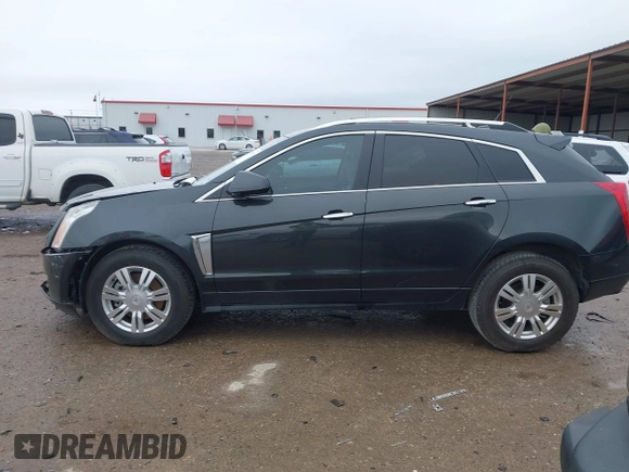 2014 Cadillac SRX Luxury Collection with VIN 3GYFNBE31ES591962, listed as a IAAI auction lot 41948735 with 97,523 mi miles and . Bid and sale history available at carsss.com. Image 14.
