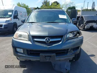 2004 Acura MDX Touring Pkg w/Navigation with VIN 2HNYD18834H517618, listed as a IAAI auction lot 42003807 with 186,555 mi miles. Bid and sale history available at carsss.com. Image 12.