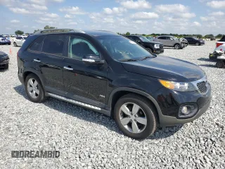2012 Kia Sorento EX z VIN 5XYKUDA25CG305111, wystawiony jako Copart lot #54216645 z przebiegiem 111 841 mil mil oraz Szkoda całkowita • Salvage title. Historia ofert i sprzedaży dostępna na DreamBid. Obrazek 4.