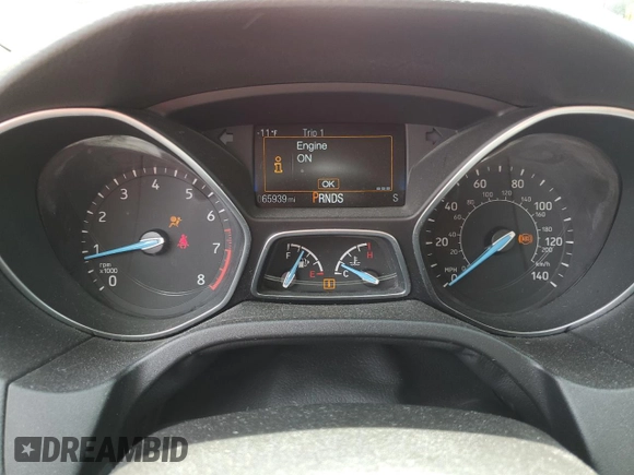 2015 Ford Focus SE z VIN 1FADP3F24FL332883, wystawiony jako Copart lot #64429655 z przebiegiem 65 939 mil mil oraz Szkoda całkowita • Salvage title. Historia ofert i sprzedaży dostępna na DreamBid. Obrazek 9.