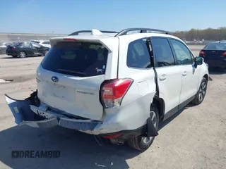 2018 Subaru Forester Limited with VIN JF2SJARCXJH417266, listed as a IAAI auction lot 42105404 with 70,174 mi miles. Bid and sale history available at carsss.com. Image 4.