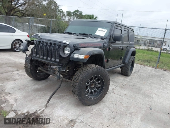 2019 Jeep Wrangler Unlimited Rubicon с VIN 1C4HJXFNXKW545294, выставлен на аукционе IAAI как лот 41613106 с пробегом 58 083 миль миль и . История ставок и продаж доступна на DreamBid. Изображение 17.