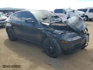 2011 BMW X6 M with VIN 5YMGZ0C54BLK13876, listed as a Copart auction lot 68567774 with 0 mi miles and Salvage Title. Bid and sale history available at carsss.com. Image 4.