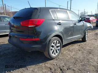 2015 Kia Sportage LX with VIN KNDPB3AC8F7761989, listed as a IAAI auction lot 41787389 with 31,706 mi miles and . Bid and sale history available at DreamBid. Image 4.