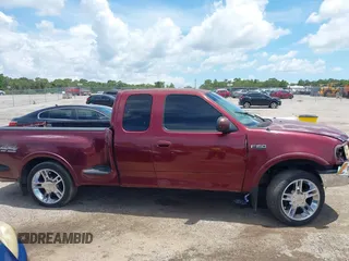 1998 Ford F-150 XL with VIN 2FTRX08L8WCA36361, listed as a IAAI auction lot 42617079 with 263,666 mi miles and . Bid and sale history available at DreamBid. Image 13.
