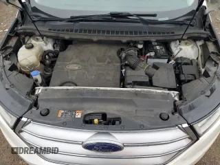 2015 Ford Edge Titanium z VIN 2FMPK4K88FBC05216, wystawiony jako Copart lot #56523475 z przebiegiem 156 558 mil mil oraz Szkoda całkowita • Salvage title. Historia ofert i sprzedaży dostępna na DreamBid. Obrazek 12.