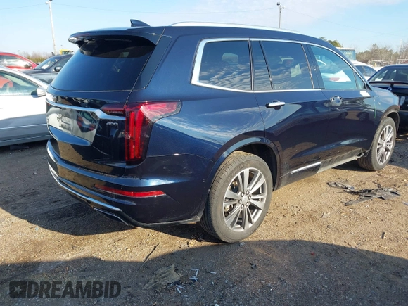 2021 Cadillac XT6 Premium Luxury with VIN 1GYKPFRS9MZ141298, listed as a IAAI auction lot 41304705 with 87,470 mi miles. Bid and sale history available at carsss.com. Image 4.