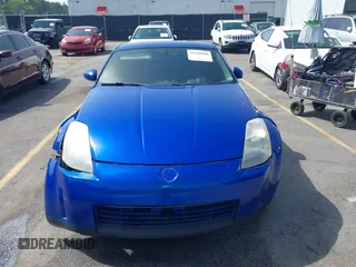 2004 Nissan 350Z Enthusiast z VIN JN1AZ34D34T150619, wystawiony jako IAAI lot #42248408 z przebiegiem 276 869 mil mil oraz . Historia ofert i sprzedaży dostępna na DreamBid. Obrazek 12.