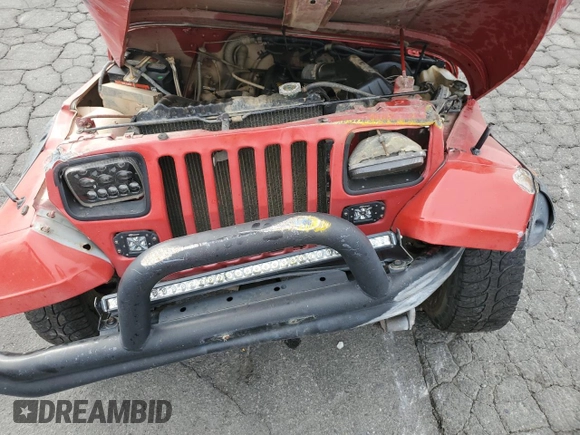 1995 Jeep Wrangler S with VIN 1J4FY19P2SP254595, listed as a Copart auction lot 82430184 with 130,942 mi miles and Salvage Title. Bid and sale history available at carsss.com. Image 11.