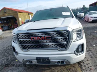 2020 GMC Sierra 1500 Denali with VIN 1GTU9FED8LZ370425, listed as a IAAI auction lot 41172378 with 57,291 mi miles and . Bid and sale history available at DreamBid. Image 12.