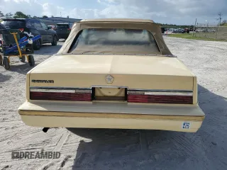 1982 Chrysler LeBaron z VIN 1C3BC45B6CG185348, wystawiony jako Copart lot #47381185 z przebiegiem 69 381 mil mil oraz Tytuł czysty. Historia ofert i sprzedaży dostępna na DreamBid. Obrazek 6.