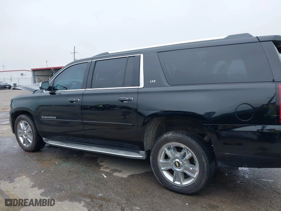 2015 Chevrolet Suburban LTZ with VIN 1GNSCKKC6FR271675, listed as a IAAI auction lot 41915036 with 150,917 mi miles. Bid and sale history available at carsss.com. Image 14.