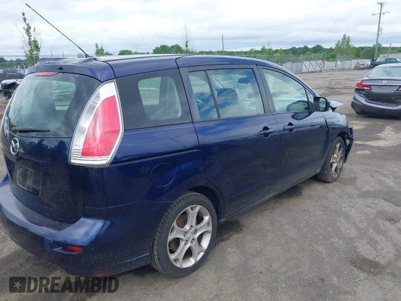 2010 Mazda 5 Sport with VIN JM1CR2W31A0364476, listed as a IAAI auction lot 42220961 with 177,885 mi miles and . Bid and sale history available at DreamBid. Image 4.