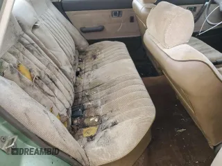 1981 Mazda 626 z VIN JM1GB2216B0531636, wystawiony jako Copart lot #85505404 z przebiegiem 41 816 mil mil oraz Szkoda całkowita • Salvage title. Historia ofert i sprzedaży dostępna na DreamBid. Obrazek 10.