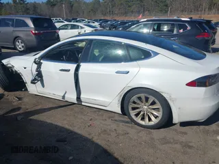 2017 Tesla Model S 100D with VIN 5YJSA1E22HF219352, listed as a IAAI auction lot 41831322 with 97,516 mi miles and . Bid and sale history available at DreamBid. Image 14.