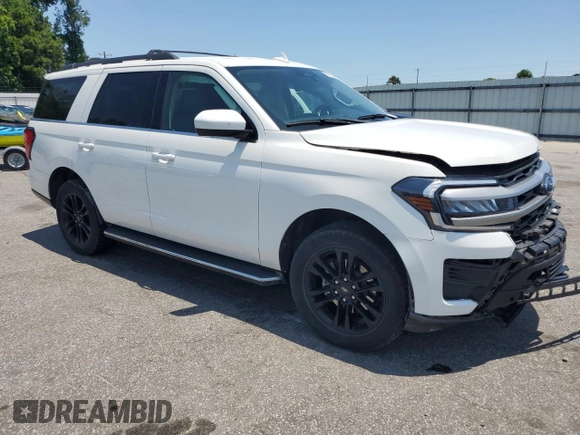 2022 Ford Expedition XLT with VIN 1FMJU1HT7NEA32284, listed as a Copart auction lot 61498915 with 23,510 mi miles and Salvage title. Bid and sale history available at DreamBid. Image 4.